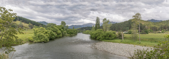 river Moteka in green valley, near Ngatimoti, Tasman, New Zealand