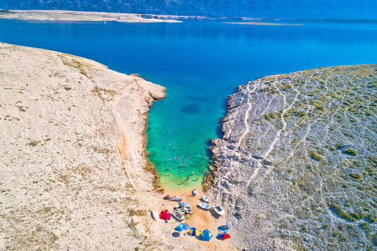 Vrsi. Zadar archipelago idyllic cove beach in stone desert scenery near Zecevo island