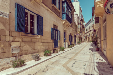 Fototapeta na wymiar Typical colourful street in Malta