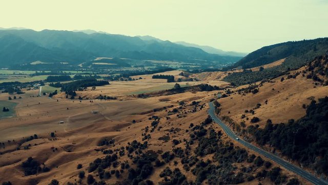 Winding Road in beautiful Upper Takaka Hill Mountains, New Zealand