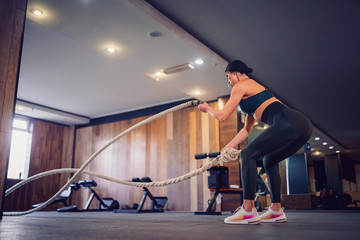 Coronavirus covid-19 prevention, fight. Girl with a medical mask and boxing gloves. Fighting...