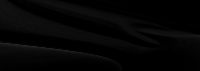 Black gray satin dark fabric texture luxurious shiny that is abstract silk cloth panorama background with patterns soft waves blur beautiful.
