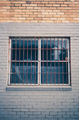 Old window with metal bars