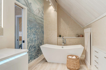 Amamzing modern new bathroom interior with wheat beige color venetian plaster, white wood vaulted ceiling, mural of bubbles and ice, natyral tone tiles, large free standing tub. 