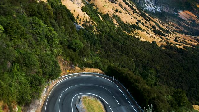 Winding Road in beautiful Upper Takaka Hill Mountains, New Zealand