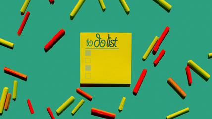 to do list post it note on green background