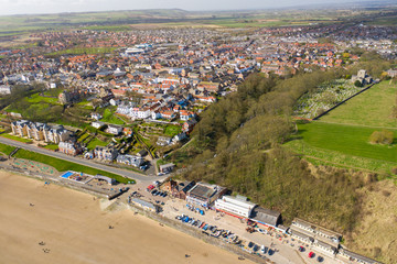 Aerial photo of the British seaside town of Filey, the seaside coastal town is located in East Yorkshire in the North Sea coast showing the beach and ocean.