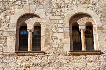 Trento downtown. Palazzo Pretorio or Palazzo Vescovile (Praetorian Palace), Ancient medieval palace with two mullioned windows (Bifora). Trentino-Alto Adige, Italy, Europe
