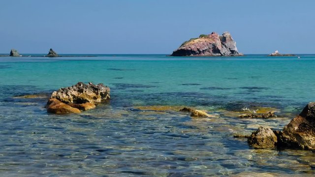 The view of the blue Takkas bay with Aphrodite's Rock.  Akamas Peninsula.  Cyprus
