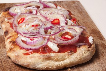 Tasty vegetarian pizza with cherry tomatoes, mozzarella cheese and basil