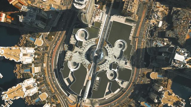 Aerial top down view of the modern monorail train station on the Palm Jumeirah island, United Arab Emirates