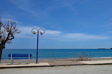 bench and lamp at the beach