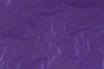 Purple crumpled paper for backgrounds or textures.