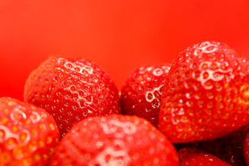 strawberries on red