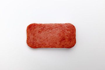 Baked canned ham on white background