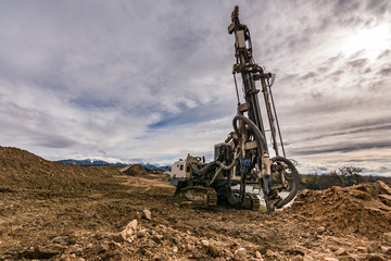 Drilling rock in the works of creating a road