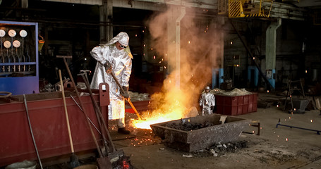 red-hot molten steel in a iron and steel enterprise production scene