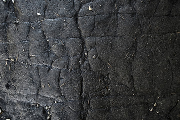 asphalt in cracks texture / abstract background cracks on asphalt road