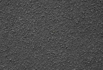 background and texture of black sand spray on decorative wall