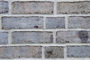 Old cracked brick wall texture. Surface and backound for web design.