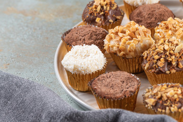 Brigadeiro is a common Brazilian dessert. Delicious chocolate candy Brigadeiro on a table