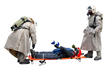 Pandemic, epidemic, chemical, radiation, or biological contamination. Rescuers in a chemical or biological protection suit rescue a victim of chemical or biological contamination on a stretcher.