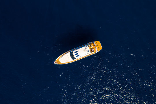 Aerial Drone Top Down Photo Of Luxury Yacht Boat Near The Famous Island Of Capri, Italy.