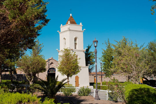 San Lucas church tower built in 1740 in the main square of the village named Toconao in an oasis at the Salar de Atacama, Atacama desert, Antofagasta Region, Chile.