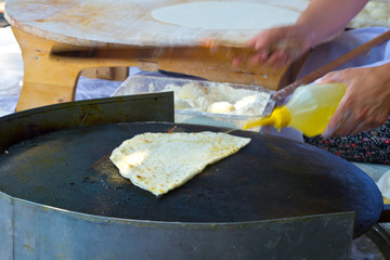Making Traditional Turkish Gözleme. It is a traditional savory Turkish flatbread and pastry dish.