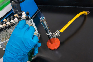 Bunsen burner used for endothermic reactions. Laboratory Bunsen burner. Laboratory gas flame