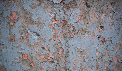 Texture of an old wall covered with paint. Background image of a worn paint coated surface