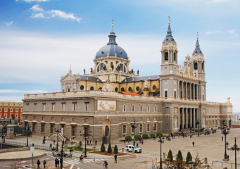 Fototapeta na wymiar Madrid, Spain, Almudena Cathedral. This is one of the main attractions of Madrid. This Cathedral is dedicated to the virgin Almudena, considered the patroness of Madrid. Both façade in a neoclassical