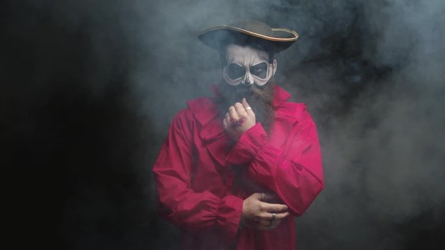 Man with long beard dressed up like a pirate