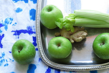 green apple and measuring tape