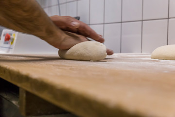 Baker preparing the bread dough