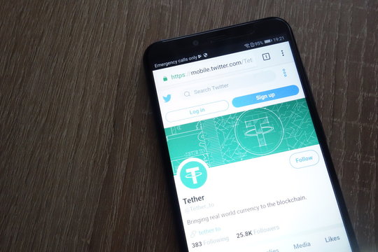 KONSKIE, POLAND - JUNE 30, 2018: Tether cryptocurrency  Twitter website displayed on Huawei Y6 2018 smartphone