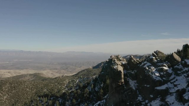 Flying over the high elevation alpine regions of Mt. Lemmon in Tucson, Arizona with snow on the ground.
