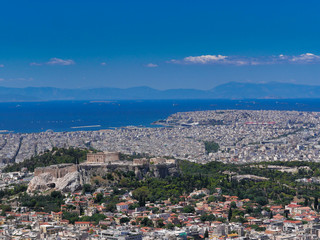 Athens Greece, panoramic view of the urban texture with Parthenon and other ancient temples on Acropolis hill