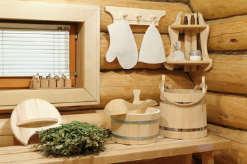 Sauna accessories by the window in the bathhouse. 