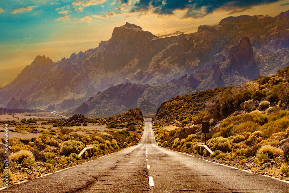 Canvas Prints image related to unexplored road journeys and adventures.road through the scenic landscape to the de
