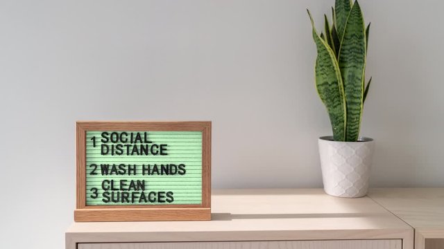 Coronavirus COVID-19 Prevention sign for social distance, hand hygiene, sanitisation of surface. Scial distancing, washing hands frequently, cleaning surfaces. CINEMAGRAPH - seamless loop.