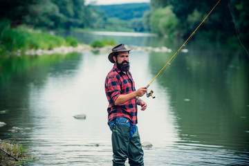 Male hobby. Ready for fishing. Relax in natural environment. Trout bait. Bearded elegant man. Man...