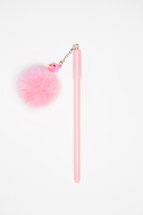 Pink pen with fur isolated on white background