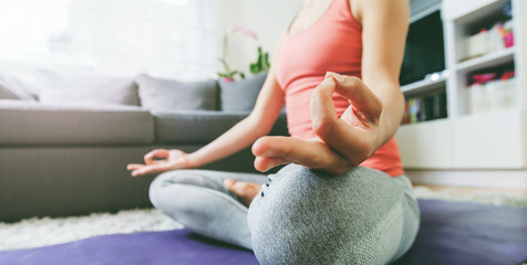 Woman Practicing Yoga and Meditation