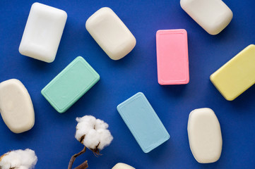 Various soap bar on a blue background