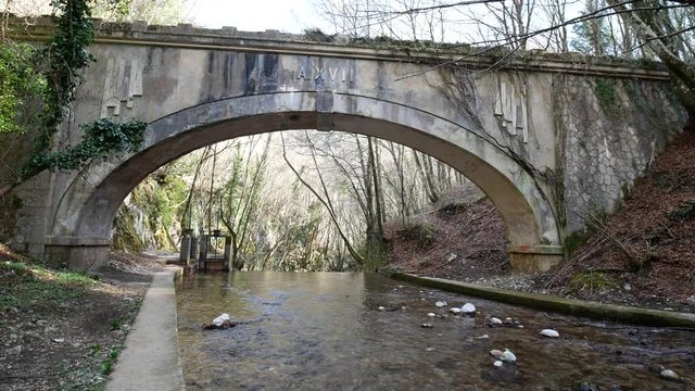 building of the fascist era. Aqueduct with a fascist bridge over the Calore river in Montella, Avellino, Campania, Italy