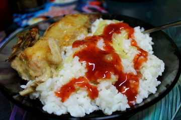 rice with meat, vegetables and tomato sauce 
