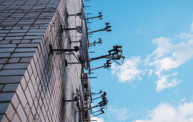 Many satellite dish antennas on the house