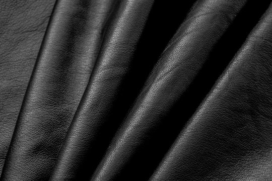 Closeup of black soft nappa leather background