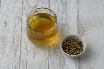 natural herbal tea with chamomile flowers